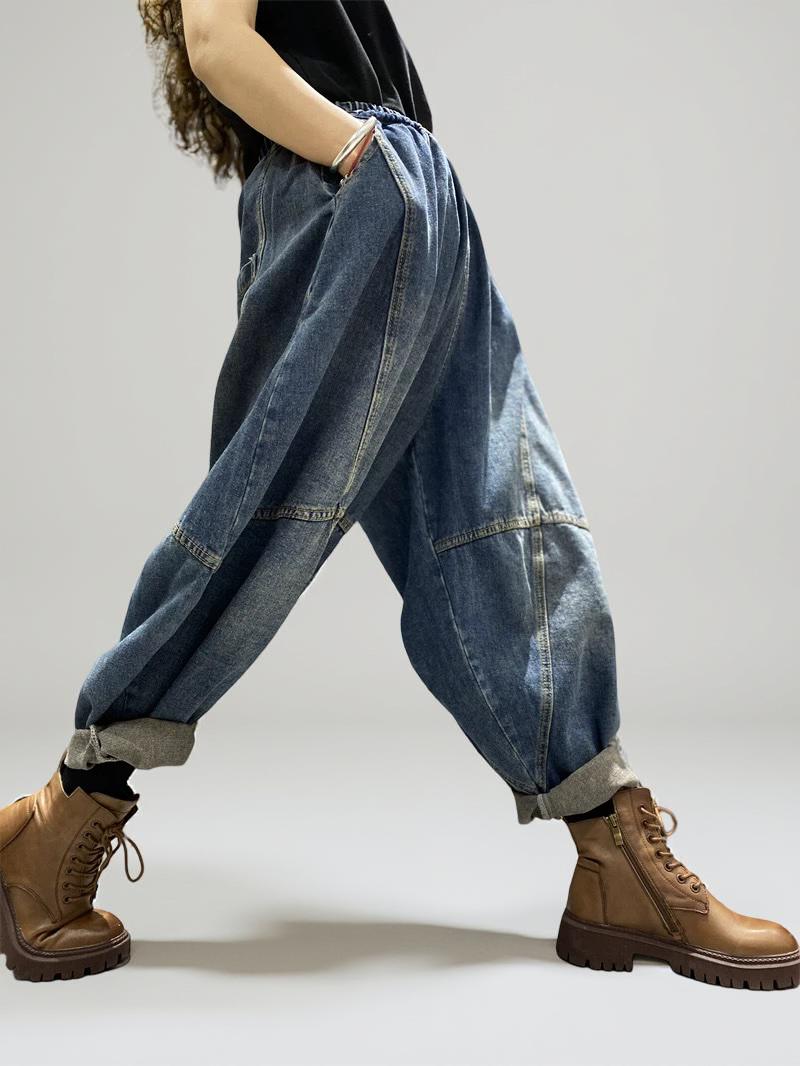 Side view of oversized patchwork denim harem pants showing the relaxed balloon fit.