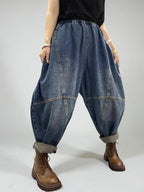Vintage washed oversized denim harem pants featuring a loose balloon silhouette.