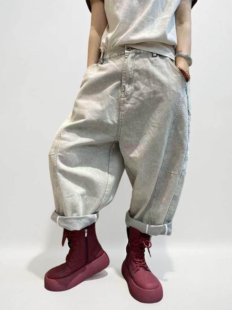 Light gray oversized harem jeans featuring a relaxed balloon silhouette.