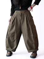 Front view of brown (olive green) high-waisted balloon workwear pants.