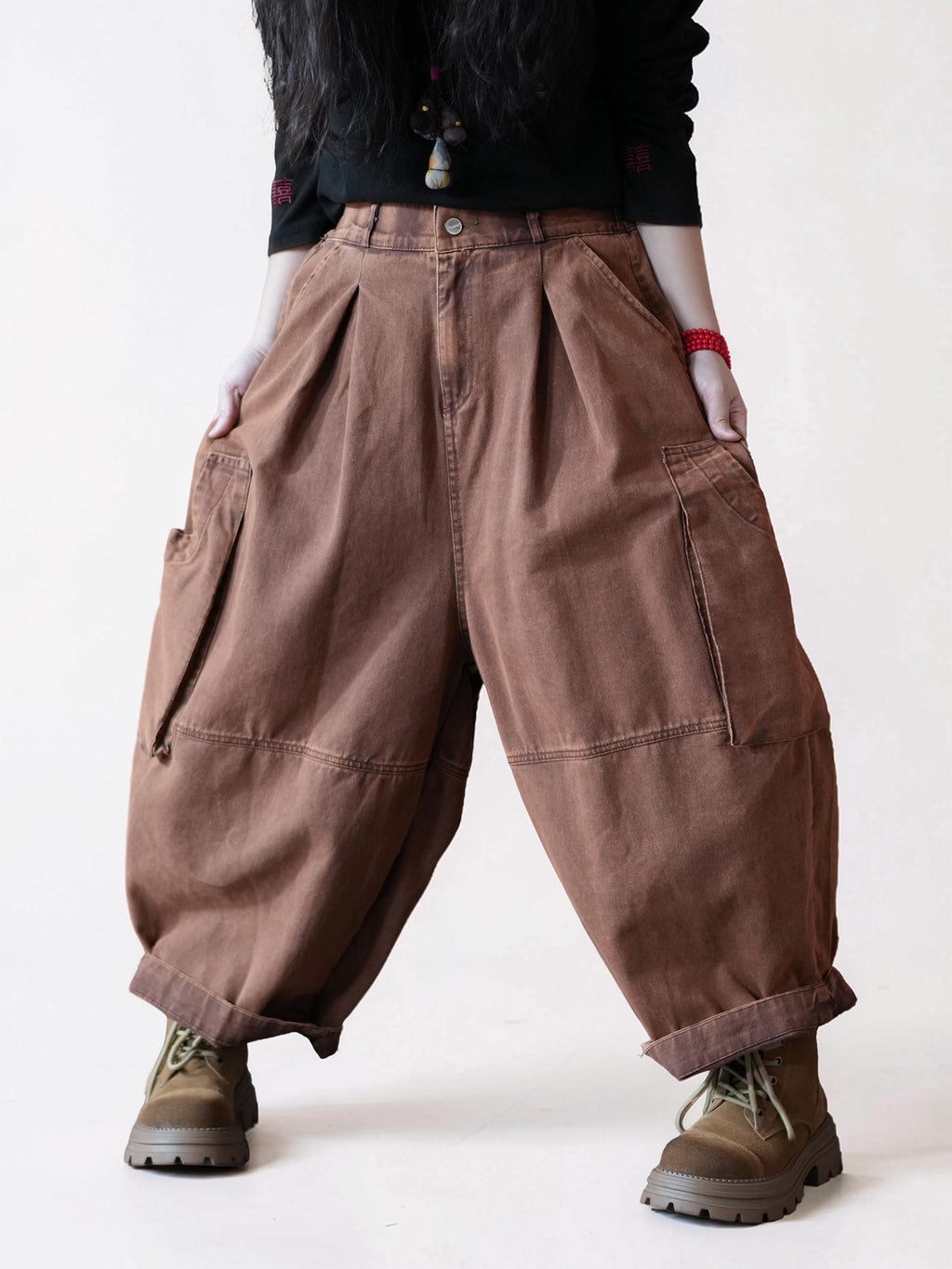 Front view of high-waisted rose brown vintage washed balloon pants.