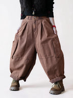 Front view of high-waisted rose brown vintage washed balloon pants.