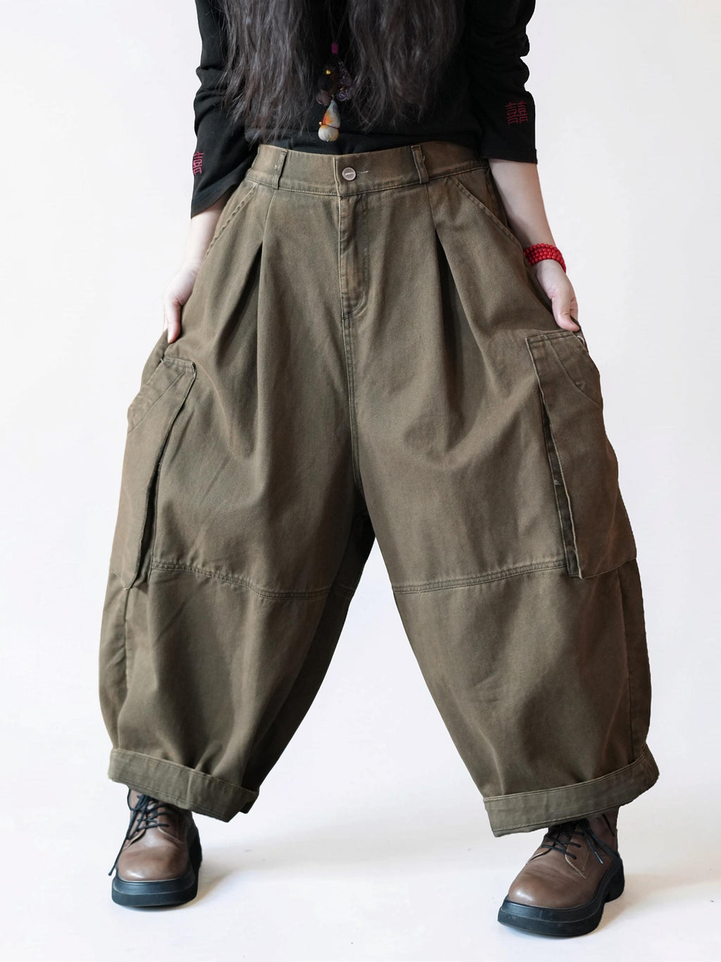 Brown (Olive green) vintage washed balloon cargo pants with an oversized workwear silhouette.